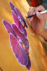 Alexis Puleio painting purple orchids, Third On Canvas